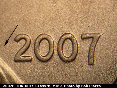 Die-stage B marker on 2007P•1DR•001 (2007 Doubled Die Reverse).
