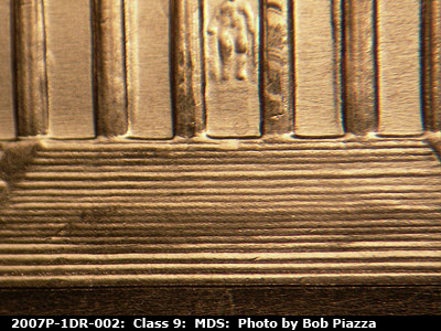 Die-stage B marker on 2007P•1DR•002 (2007 Doubled Die Reverse).
