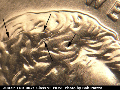 Die-stage B marker on 2007P•1DR•002 (2007 Doubled Die Reverse).
