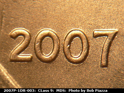 Die-stage B marker on 2007P•1DR•003 (2007 Doubled Die Reverse).