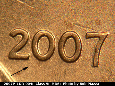Die-stage B marker on 2007P•1DR•004 (2007 Doubled Die Reverse).