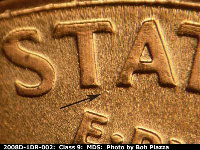 Die-stage B marker on 2008D•1DR•002 (2008 Doubled Die Reverse).