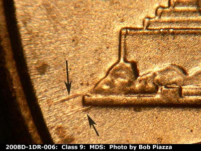 Die-stage B marker on 2008D•1DR•006 (2008 Doubled Die Reverse).