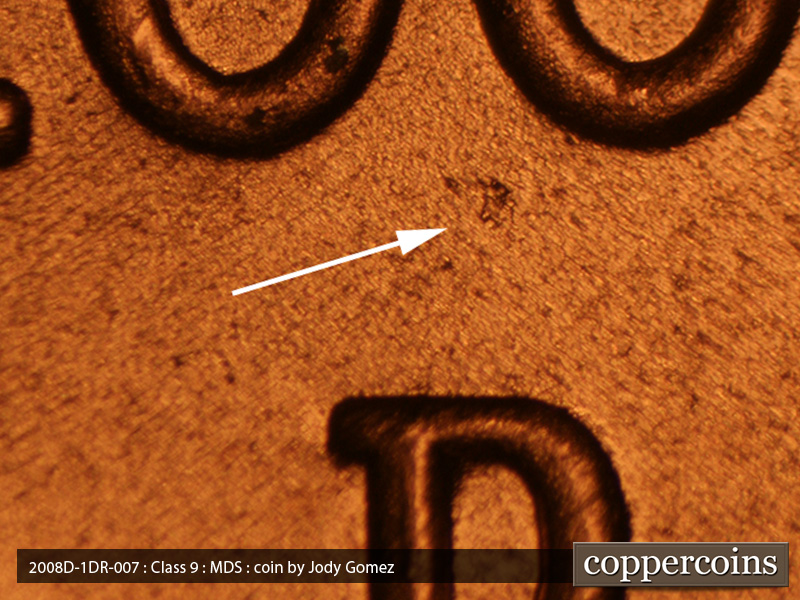 Die-stage B marker on 2008D•1DR•007 (2008 Doubled Die Reverse).