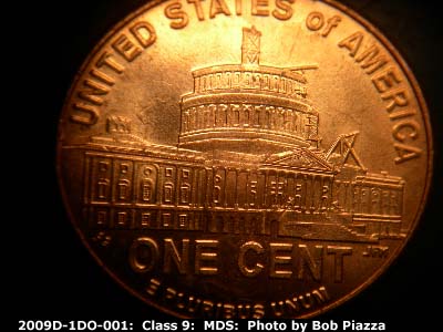Die-stage B marker on 2009D•1DO•001 (2009 Doubled Die Obverse).