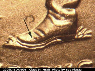 Die-stage B marker on 2009D•1DR•001 (2009 Doubled Die Reverse).