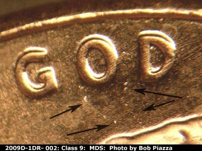 Die-stage B marker on 2009D•1DR•002 (2009 Doubled Die Reverse).