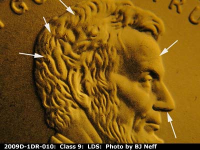 Die-stage C marker on 2009D•1DR•010 (2009 Doubled Die Reverse).