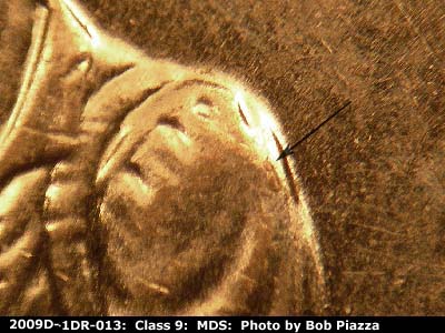 Die-stage B marker on 2009D•1DR•013 (2009 Doubled Die Reverse).