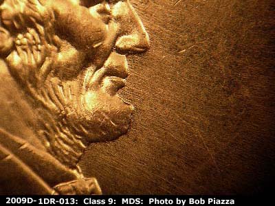 Die-stage B marker on 2009D•1DR•013 (2009 Doubled Die Reverse).