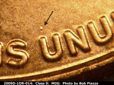 Die-stage B marker on 2009D•1DR•014 (2009 Doubled Die Reverse).
