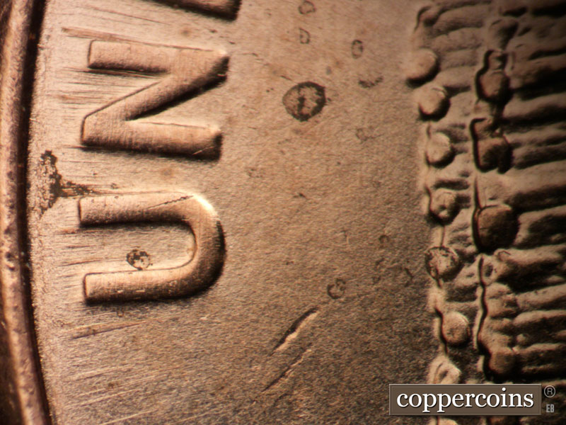Die-stage B marker on 2009D•1DR•015 (2009 Doubled Die Reverse).