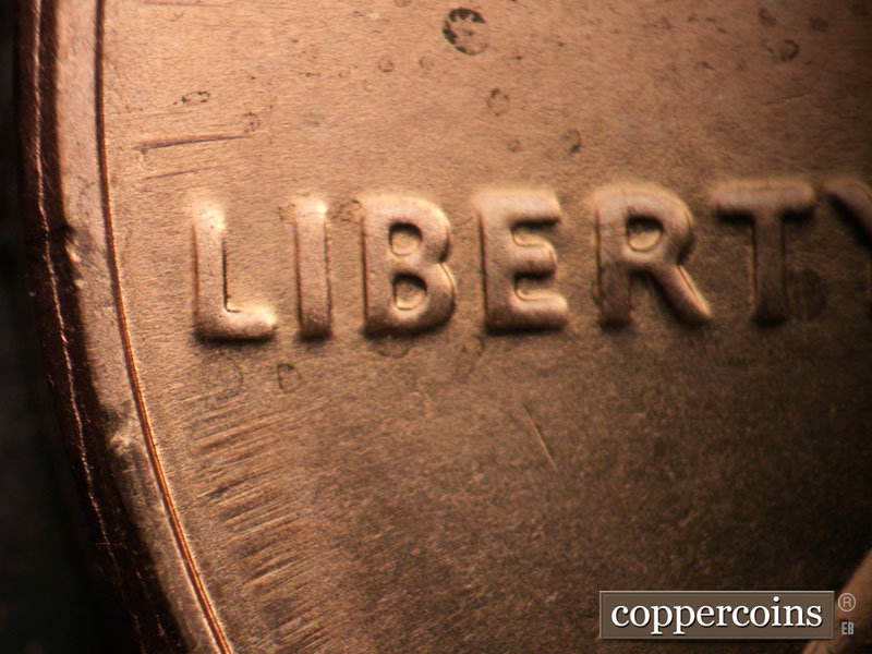 Die-stage B marker on 2009D•1DR•015 (2009 Doubled Die Reverse).