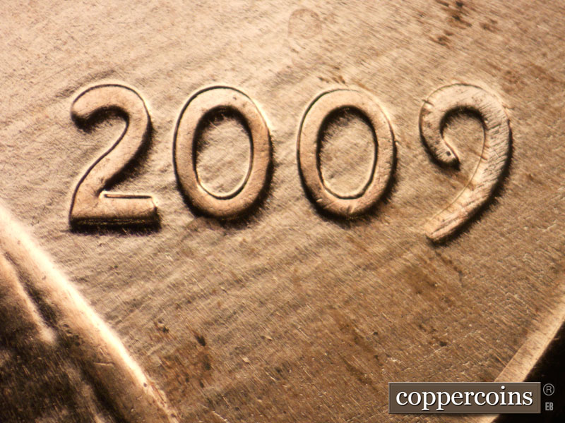 Die-stage B marker on 2009P•1DO•001 (2009 Doubled Die Obverse).