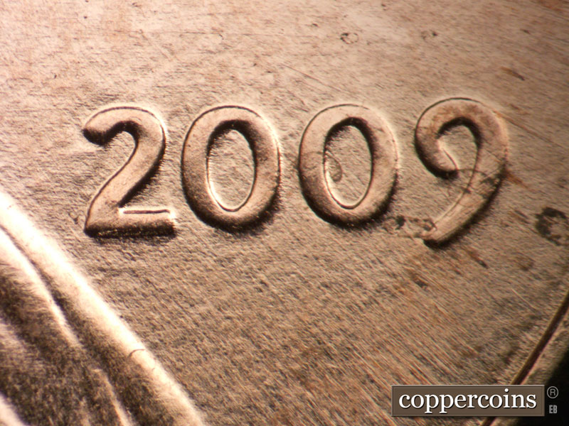 Die-stage C marker on 2009P•1DO•002 (2009 Doubled Die Obverse).