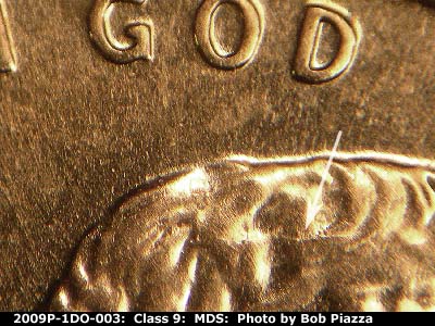 Die-stage B marker on 2009P•1DO•003 (2009 Doubled Die Obverse).