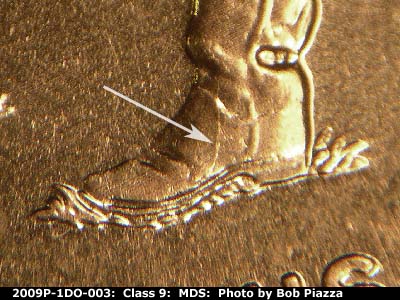 Die-stage B marker on 2009P•1DO•003 (2009 Doubled Die Obverse).
