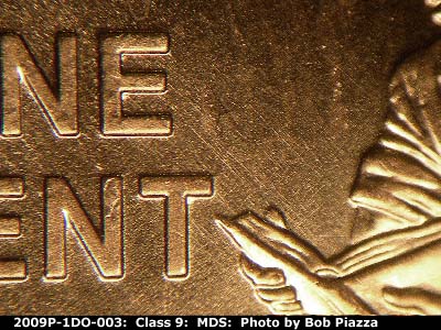 Die-stage B marker on 2009P•1DO•003 (2009 Doubled Die Obverse).