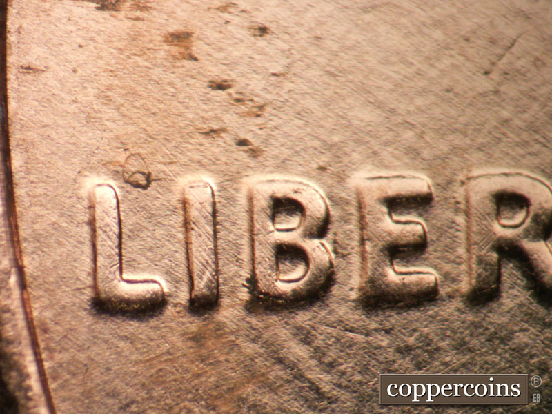 Die-stage A marker on 2009P•1DO•010 (2009 Doubled Die Obverse).