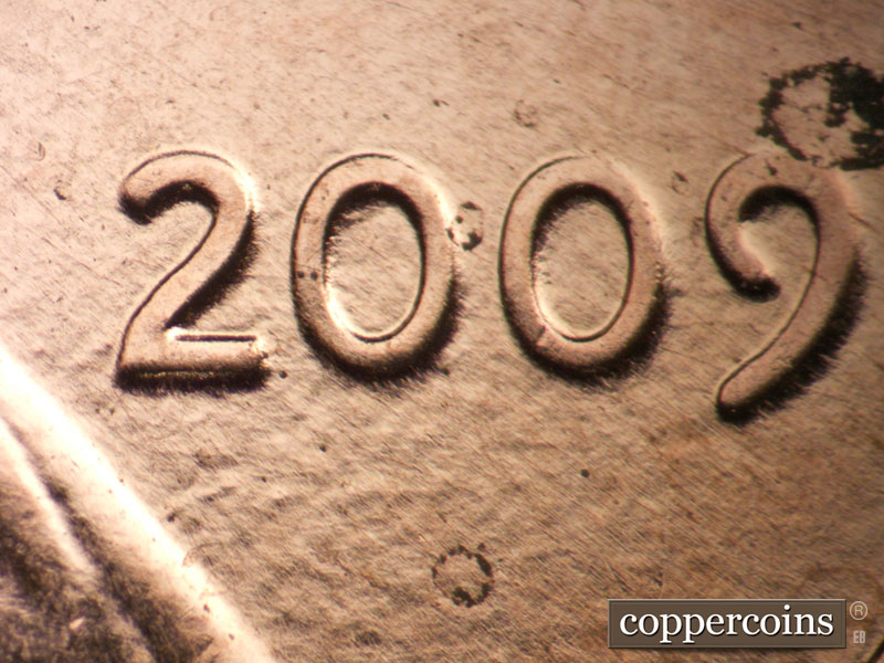 Die-stage B marker on 2009P•1DO•010 (2009 Doubled Die Obverse).