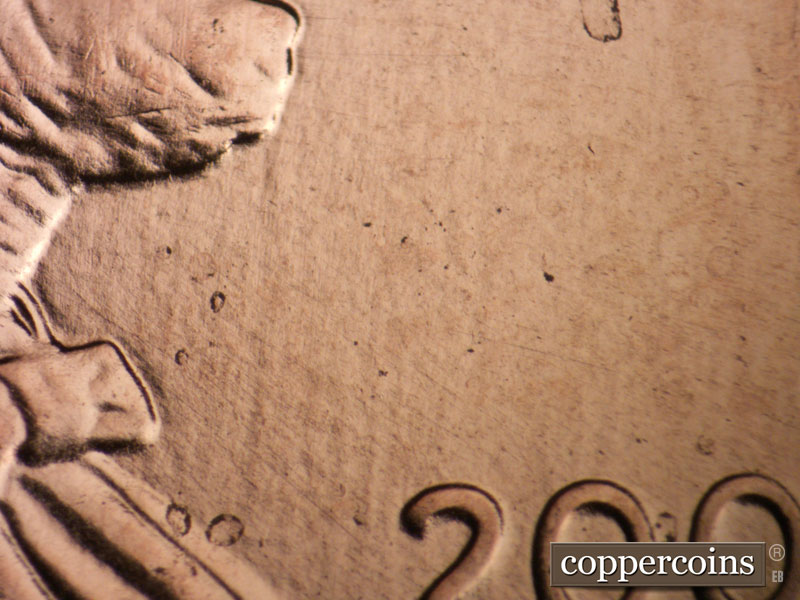 Die-stage B marker on 2009P•1DO•010 (2009 Doubled Die Obverse).
