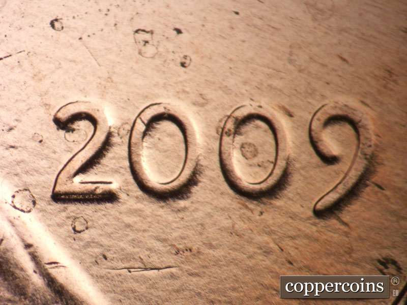 Die-stage B marker on 2009P•1DO•011 (2009 Doubled Die Obverse).