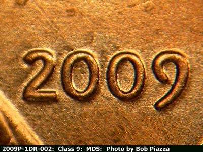 Die-stage B marker on 2009P•1DR•002 (2009 Doubled Die Reverse).
