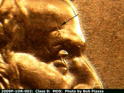 Die-stage B marker on 2009P•1DR•002 (2009 Doubled Die Reverse).