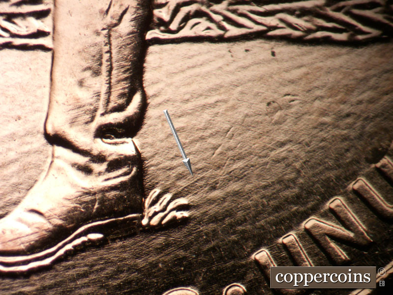 Die-stage B marker on 2009P•1DR•004 (2009 Doubled Die Reverse).