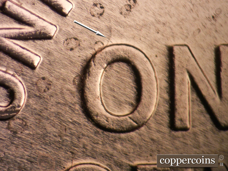 Die-stage B marker on 2009P•1DR•004 (2009 Doubled Die Reverse).