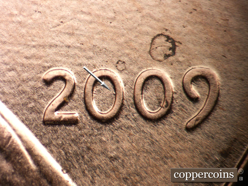 Die-stage B marker on 2009P•1DR•004 (2009 Doubled Die Reverse).