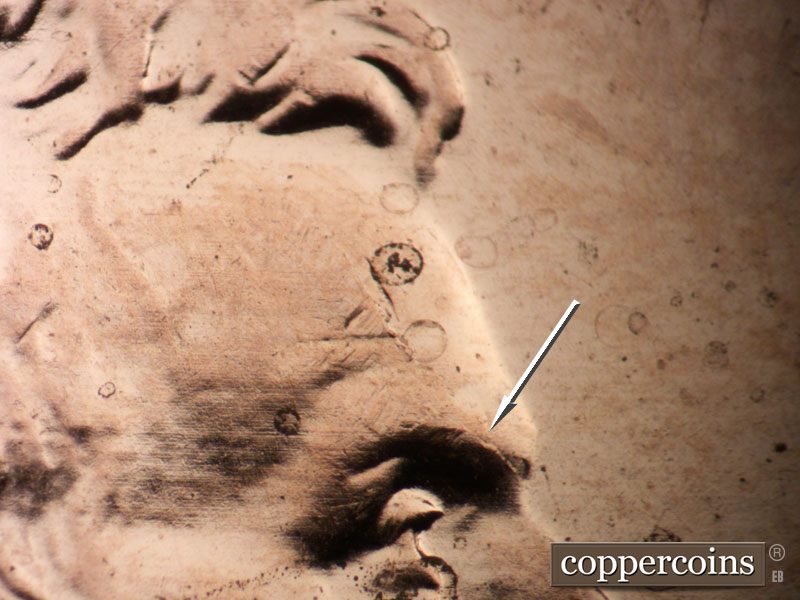 Die-stage B marker on 2009P•1DR•004 (2009 Doubled Die Reverse).