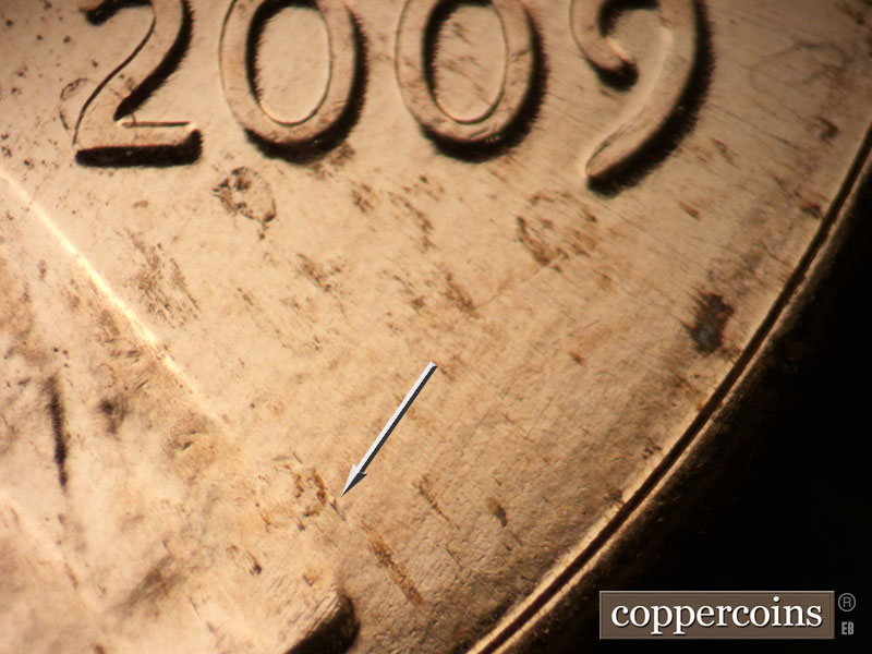 Die-stage A marker on 2009P•1DR•009 (2009 Doubled Die Reverse).