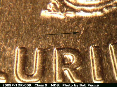Die-stage B marker on 2009P•1DR•009 (2009 Doubled Die Reverse).
