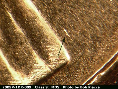 Die-stage B marker on 2009P•1DR•009 (2009 Doubled Die Reverse).
