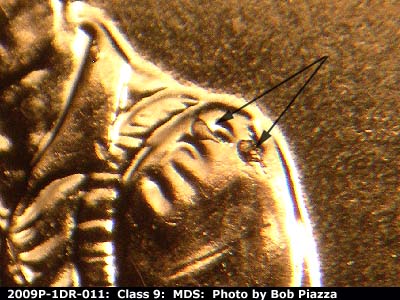 Die-stage B marker on 2009P•1DR•011 (2009 Doubled Die Reverse).