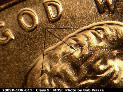 Die-stage B marker on 2009P•1DR•011 (2009 Doubled Die Reverse).