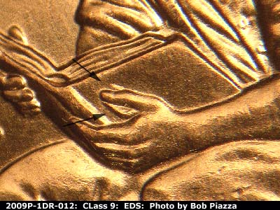 Die-stage A marker on 2009P•1DR•012 (2009 Doubled Die Reverse).