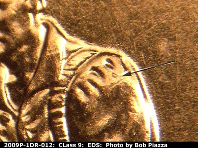 Die-stage A marker on 2009P•1DR•012 (2009 Doubled Die Reverse).