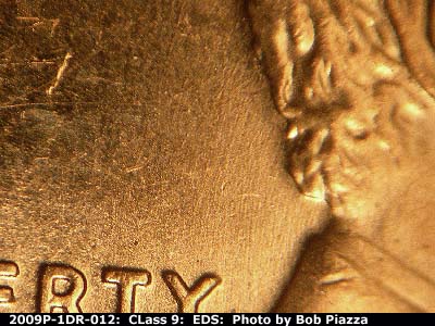 Die-stage A marker on 2009P•1DR•012 (2009 Doubled Die Reverse).