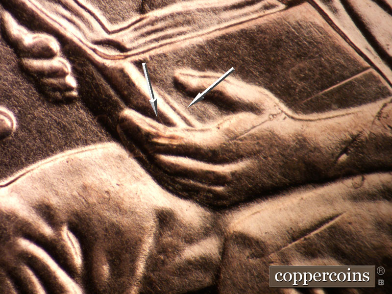 Die-stage A marker on 2009P•1DR•014 (2009 Doubled Die Reverse).