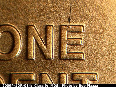 Die-stage B marker on 2009P•1DR•014 (2009 Doubled Die Reverse).