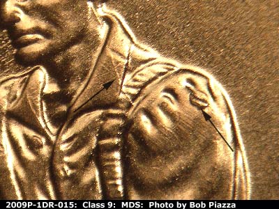 Die-stage B marker on 2009P•1DR•015 (2009 Doubled Die Reverse).