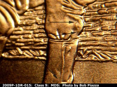 Die-stage B marker on 2009P•1DR•015 (2009 Doubled Die Reverse).
