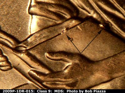 Die-stage B marker on 2009P•1DR•015 (2009 Doubled Die Reverse).