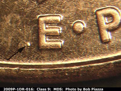Die-stage B marker on 2009P•1DR•016 (2009 Doubled Die Reverse).