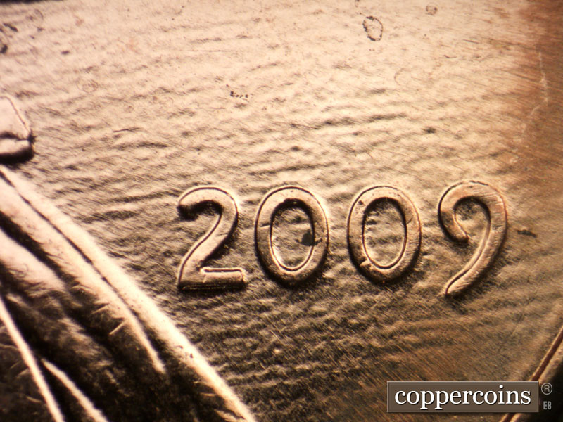 Die-stage C marker on 2009P•1DR•017 (2009 Doubled Die Reverse).