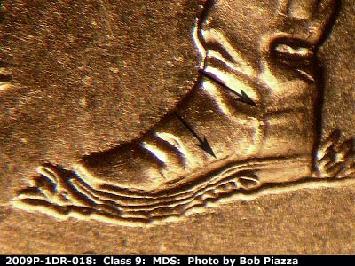 Die-stage B marker on 2009P•1DR•018 (2009 Doubled Die Reverse).