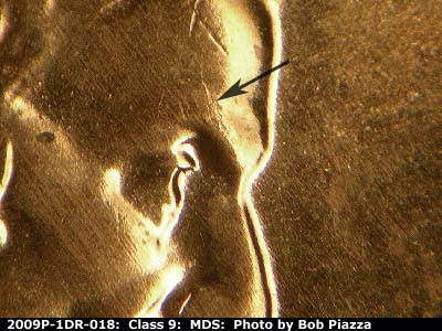 Die-stage B marker on 2009P•1DR•018 (2009 Doubled Die Reverse).
