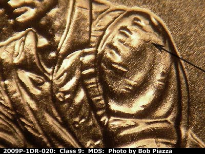 Die-stage B marker on 2009P•1DR•020 (2009 Doubled Die Reverse).